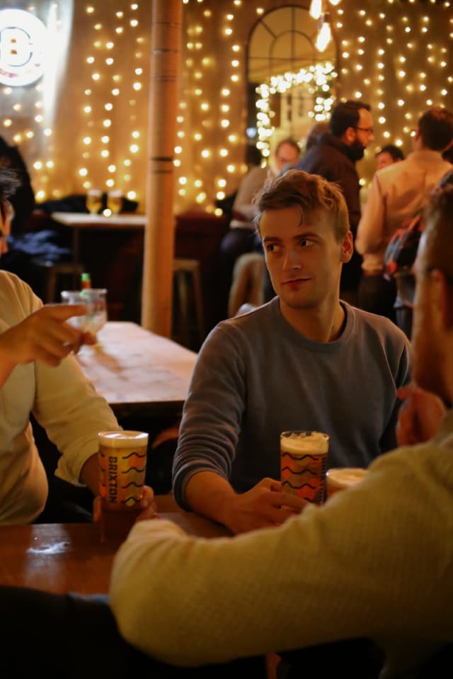 A man looking at his friend
